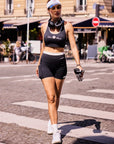 High Slit Contrast Active Shorts Navy in street style, women's athletic shorts with built-in liner, side slit design, and lightweight sporty fit