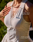 La Rose Collared V Neck Top detail, showcasing deep V neckline design, UPF 50+ sun protection fabric, sculpting fit, and elegant women's tennis top style