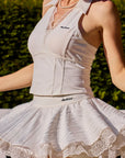 La Rose Collared V Neck Top close up styling detail, showcasing collared deep V neckline, rose lace trim, sculpting seams, and premium women's tennis activewear fabric