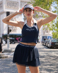 La Rose French Collar Tank Navy, women's tennis tank top with French collar V neckline, sculpting fit, open back design, and elegant sporty style