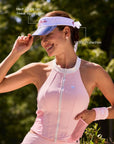 La Rose Ruffle Performance Visor White detail, featuring signature rose embroidery, breathable perforated forehead zone, and lightweight UV protective design