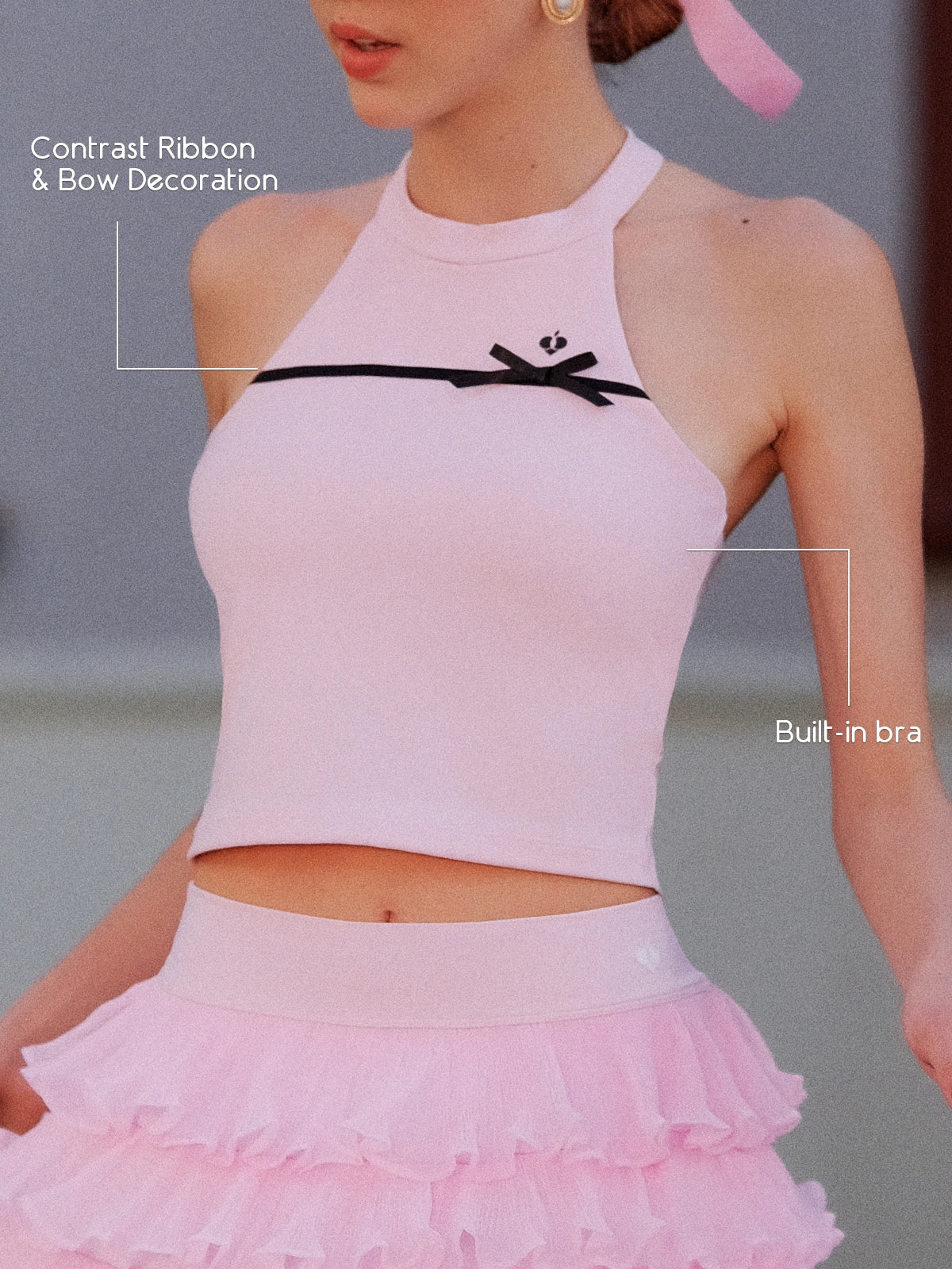 Pink Bow Halter Tennis Top – contrast black ribbon bow and built-in bra callout, four-way stretch performance fabric