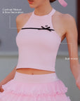 Pink Bow Halter Tennis Top – contrast black ribbon bow and built-in bra callout, four-way stretch performance fabric