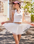 Poise™ Open-Back Polo Tennis Top White – Women's Cropped Halter Activewear Top Styled with Tulle Tennis Skirt, Paris