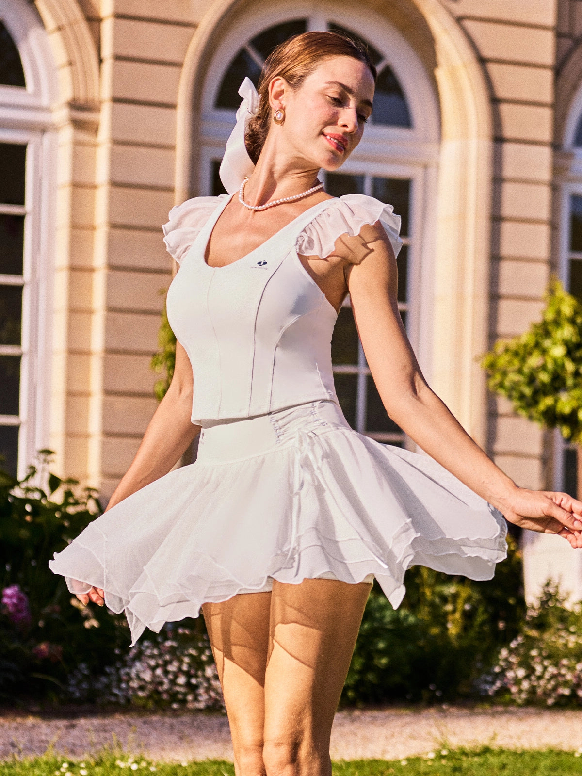 Poise™ Petal V-Neck Tennis Tank White – Women's Flutter Sleeve Activewear Top Styled with Tulle Tennis Skirt, French Estate Editorial