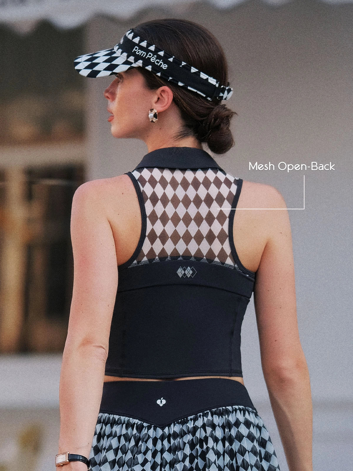 Polo tennis top back view showcasing breathable mesh back design, comfortable fit, and unrestricted movement during sports