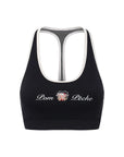 Flat lay of Pom Pêche x Betty Boop Mesh Back Tank Top in black – scoop neckline, Betty Boop collab logo, white contrast trim and mesh racerback on white background