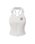 Flat lay of Pom Pêche x Betty Boop Poise™ Polo Tank in white – polo collar, vertical Pom FlexRib™ ribbed texture with Betty Boop Pom Pêche circular badge, full-length front zip and racerback silhouette on white background