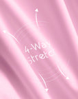 Fabric close-up of Pom Pêche x Betty Boop pink tank top showing 4-way stretch LYCRA® nylon-spandex double-knit – anti-static, moisture-wicking and skin-friendly for active wear