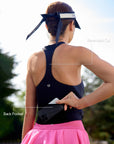 Back view of Pom Pêche zip-neck halter tank showing open racerback cut and back mesh pocket with phone – breathable design for unrestricted movement on court