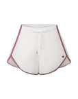 Flat lay of Pom Pêche High-Slit Contrast Active Shorts in white – elastic drawstring waist, red and navy contrast piping, high side slits and embroidered logo detail