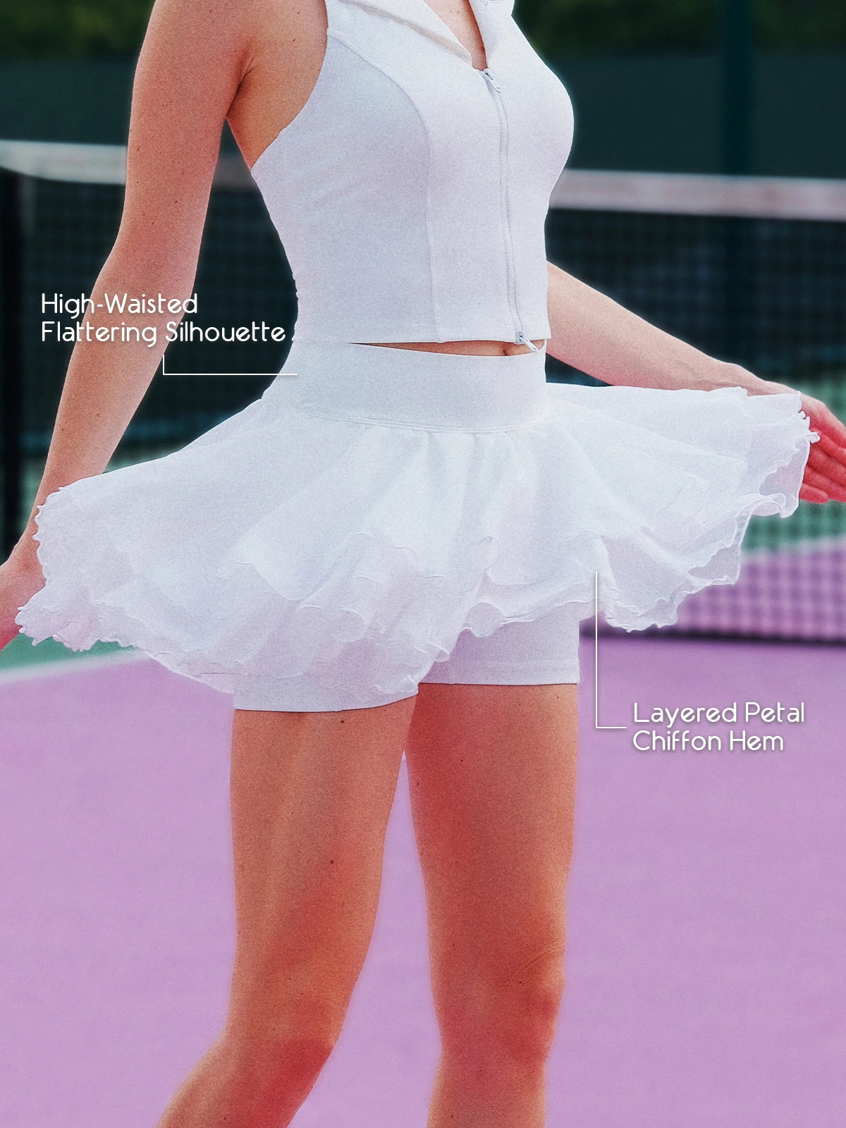 Pom Pêche white Petal Tiered Skirt feature callout – high-waisted flattering silhouette for leg-lengthening fit and layered petal chiffon hem for graceful movement on tennis court