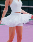Pom Pêche white Petal Tiered Skirt feature callout – high-waisted flattering silhouette for leg-lengthening fit and layered petal chiffon hem for graceful movement on tennis court