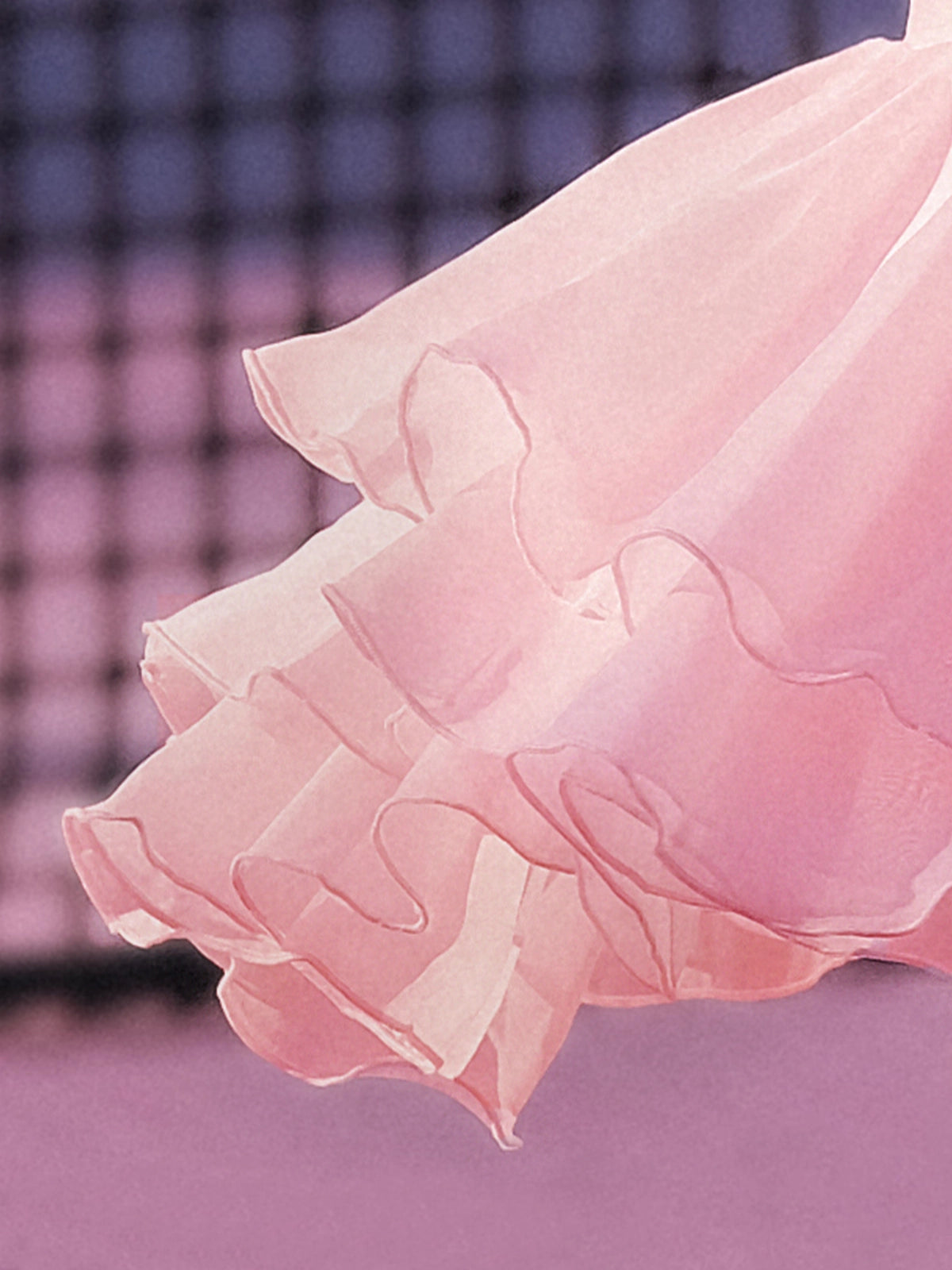 Macro detail of Pom Pêche light pink Petal Tiered Skirt showing three-tier featherlight chiffon layers with scalloped petal edges – soft, airy and quick-drying performance fabric