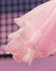 Macro detail of Pom Pêche light pink Petal Tiered Skirt showing three-tier featherlight chiffon layers with scalloped petal edges – soft, airy and quick-drying performance fabric