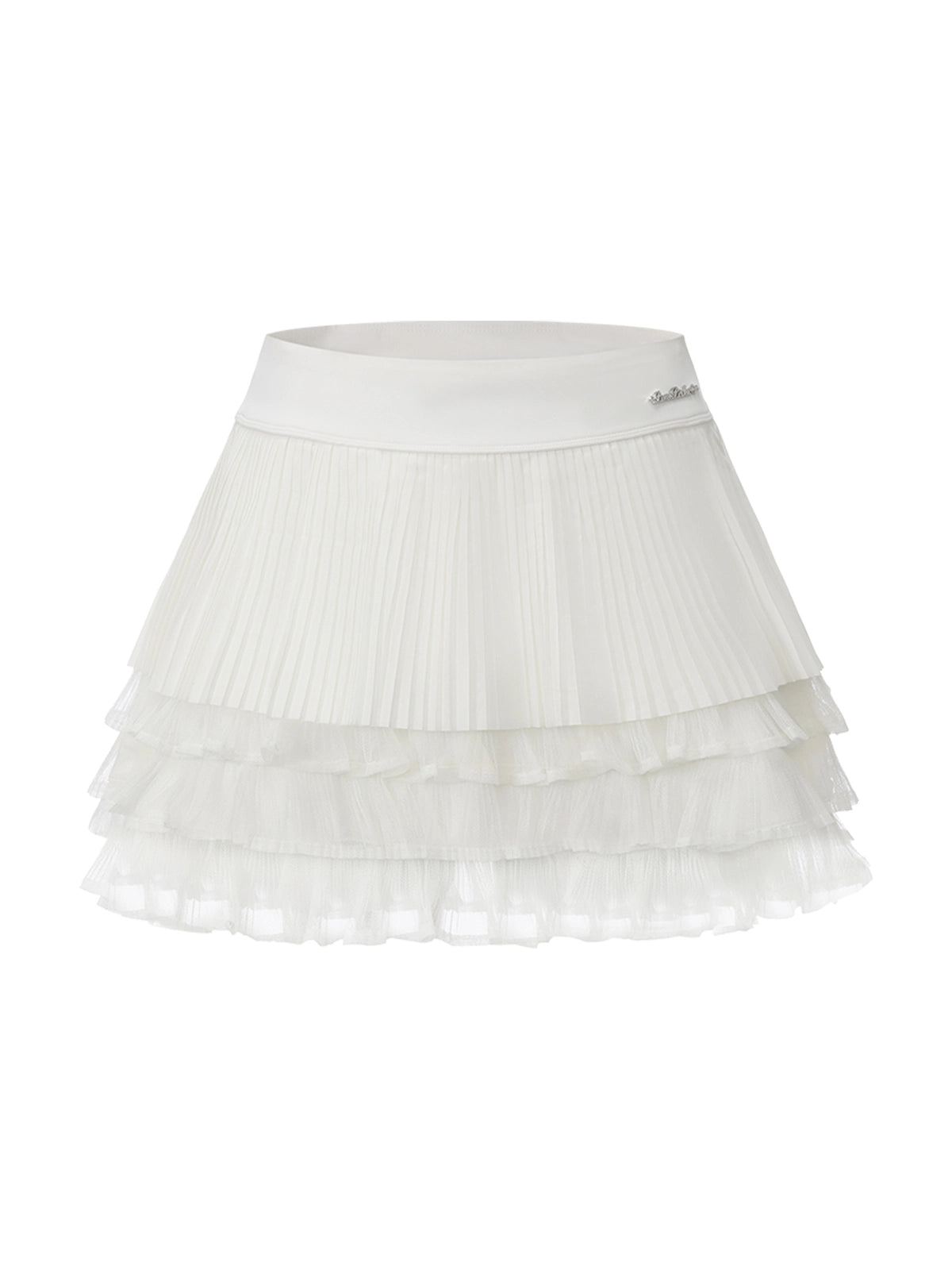 Flat lay of Pom Pêche Spin™ LaRose Pleated Tiered Skirt in white – structured high waistband with metallic logo, fine pleated outer layer and three-tier mesh ruffle hem on white background
