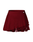 Flat lay of Pom Pêche Spin™ Waltz Layered Tennis Skirt in wine red – high-waisted band, multi-layer asymmetric pleated hem with mesh underlayer and Pom Pêche metal hardware