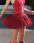 Pom Pêche wine red Waltz tennis skirt with feature callouts – high-waisted sculpting waistband for tummy support and multi-layer asymmetrical pleats for a fluid silhouette