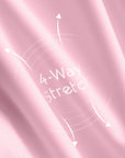 Fabric close-up of Pom Pêche blush pink Zip-Neck Halter Racerback Tank showing 4-Way Stretch LYCRA® nylon-spandex blend – premium cooling UV-protective UPF 50+ moisture-wicking performance fabric