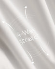 Fabric close-up of Pom Pêche white Zip-Neck Halter Tank showing 4-way stretch LYCRA® nylon-spandex blend – premium cooling UV-protective performance fabric with moisture-wicking finish