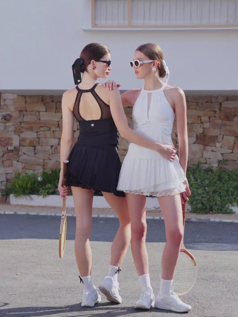 The Spin™ Waltz multi-layered tennis skirt video dynamically showcases its flowing movement and elegant pleated design.