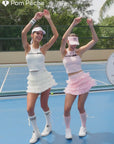 Two medoels having good time playing tennis 
