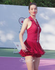 Pom Pêche Spin™ Rose Ruffle Skirt lookbook video – model spinning to showcase petal-like pleated mesh ruffle hem in tennis white, styled with matching white zip halter top on pink clay court