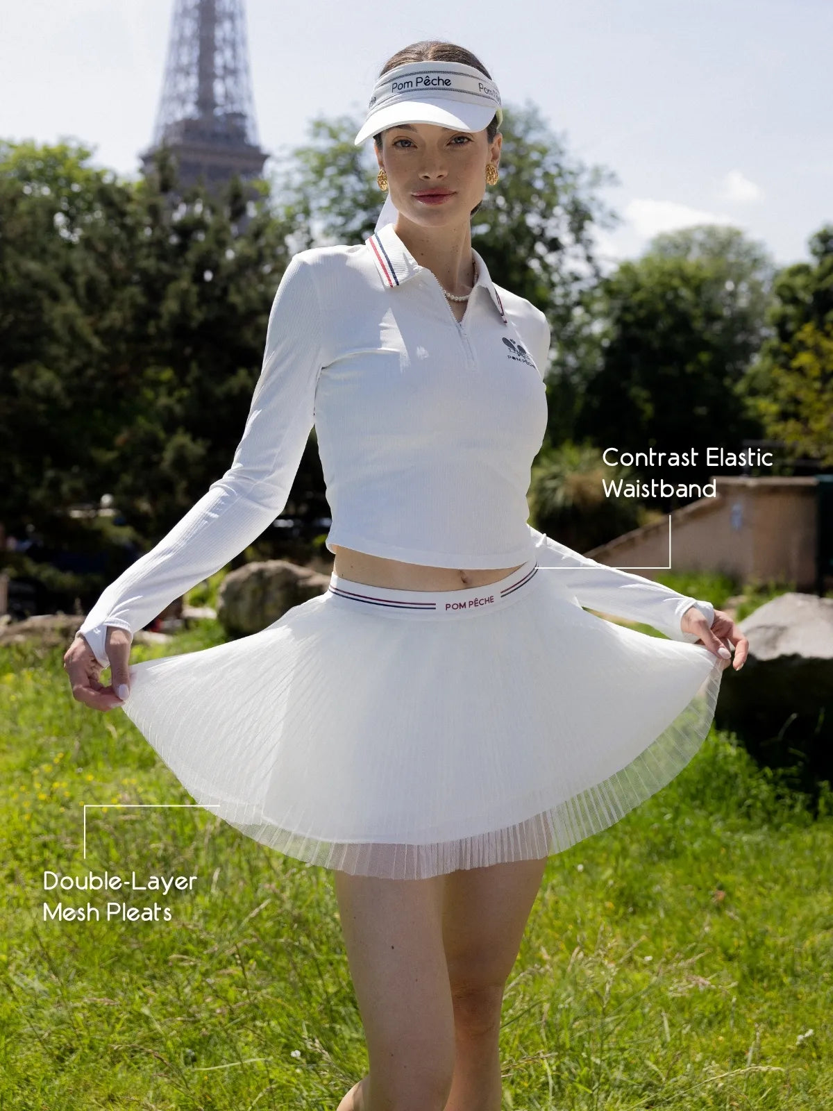 Spin Layered Mesh Pleated Tennis Skirt White detail, showcasing unique waistband design, double layer pleated mesh skirt, and elegant lightweight tennis skort silhouette