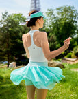 Spin Mesh Fairy Tennis Skirt Mint Green back view, showcasing three tier tulip hem design, flattering silhouette, and elegant sporty tennis skort style