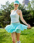 Spin Mesh Fairy Tennis Skirt Mint Green, summer color tennis skort with three tier tulip hem, flowy flower inspired skirt design, and elegant sporty style