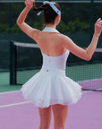 Spin Petal Tiered Skirt White back view in motion, showcasing flowing petal inspired layers, lightweight silhouette, and elegant sporty movement on and off the court