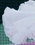 Spin Petal Tiered Skirt White in motion, showcasing flowing petal inspired tiered hem, lightweight layered design, and graceful movement