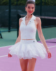 Spin Petal Tiered Skirt White, women's tennis skort with high waisted fit, petal inspired tiered layers, built in shorts, and elegant sporty style