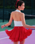 Spin Petal Tiered Skirt Wine Red back view in motion, showcasing layered chiffon design, lightweight silhouette, and elegant sporty movement