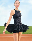 Spin™ Petal Tiered Tennis Skirt in Black, flowy high-waisted skort with chiffon hem and built-in shorts