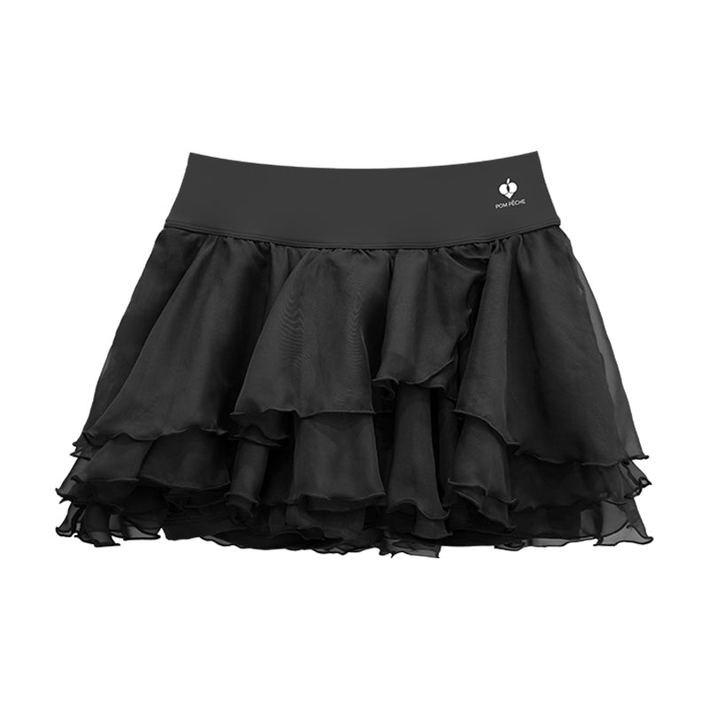 Flat lay view of Spin™ Petal Tiered Tennis Skirt in black showing layered chiffon design and built-in shorts
