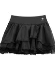 Flat lay view of Spin™ Petal Tiered Tennis Skirt in black showing layered chiffon design and built-in shorts