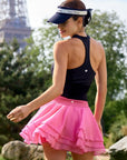Spin Rose Fairy Spin Skirt back view, showcasing layered petal-inspired chiffon hem with elegant flowy movement and feminine tennis skort style