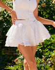 Spin™ Rose Petal Skirt in White – High-Waisted 4-Layered Ruffle Tennis Skirt with Removable 3D Rose, Women's Activewear, Pom Pêche