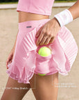 Spin™ Waltz Layered Tennis Skirt with built-in shorts and side pockets for tennis balls and essentials