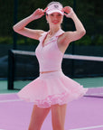 Spin™ Waltz Layered Skirt in Light Pink, high-waisted asymmetric pleated tennis skirt with built-in shorts