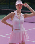 Styling inspiration for Spin™ Waltz Layered Skirt, feminine light pink tennis outfit for court and café moments