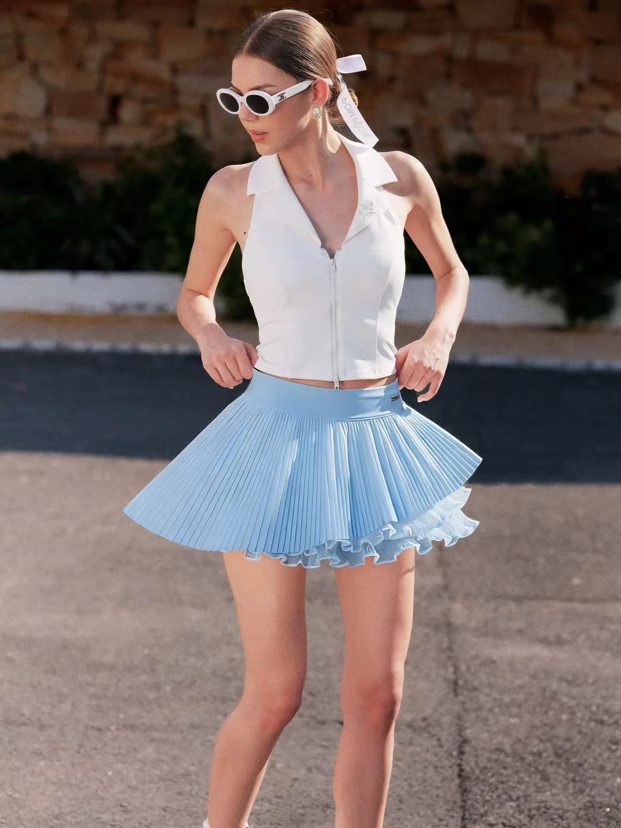 Spin™ Waltz layered tennis skirt in blue, women’s elegant pleated sporty skirt front view