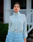 UPF cropped sun jacket in light blue, women’s lightweight sun protection jacket front view