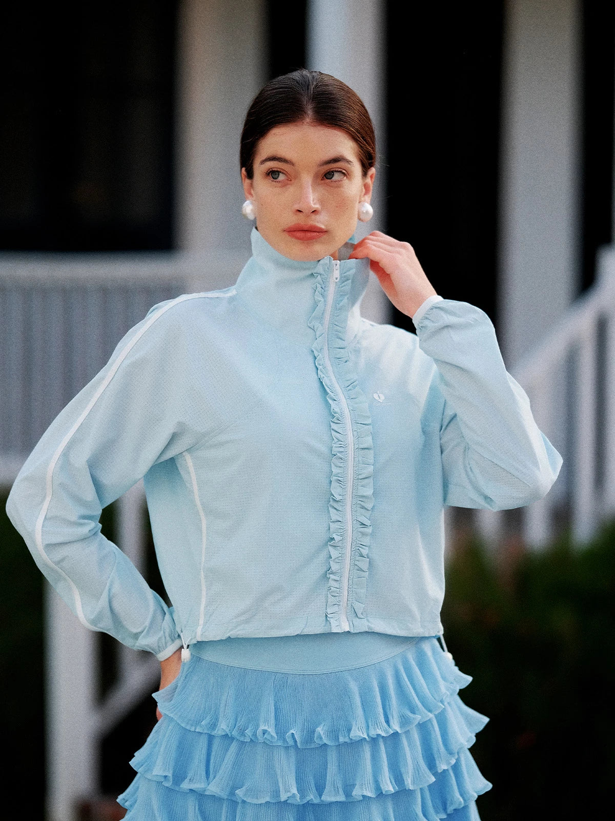 Model wearing light blue UPF cropped sun jacket, women’s lightweight breathable outdoor activewear