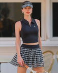 Women's polo tennis outfit featuring a stylish performance top, combining sporty elegance, sculpted fit, and court-to-casual versatility
