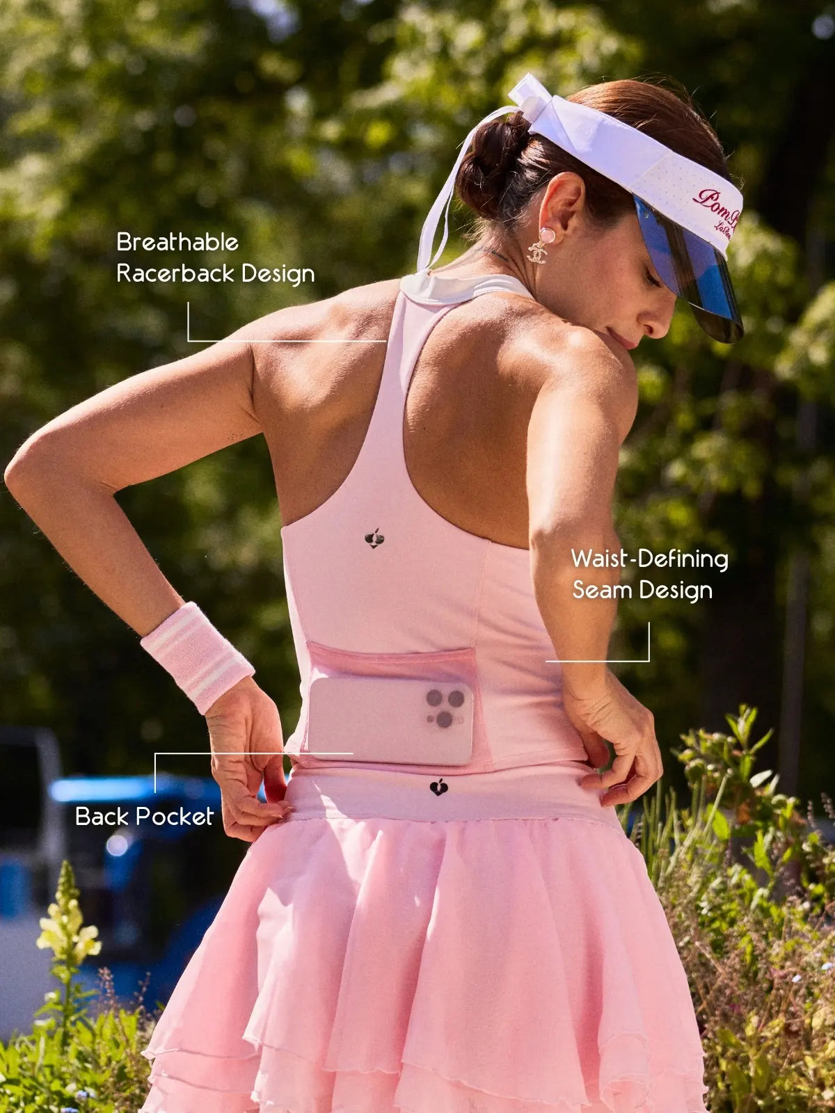 Zip-Neck Halter Racerback Tank Pink back view, featuring open racerback design and functional back pocket for phone and small essentials